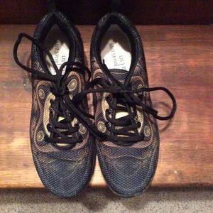 Black sneakers with colorful design.